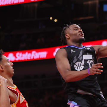 Apr 6, 2025; Atlanta, Georgia, USA; Utah Jazz guard Isaiah Collier (13) shoots against the Atlanta Hawks in the third quarter at State Farm Arena. Mandatory Credit: Brett Davis-Imagn Images
