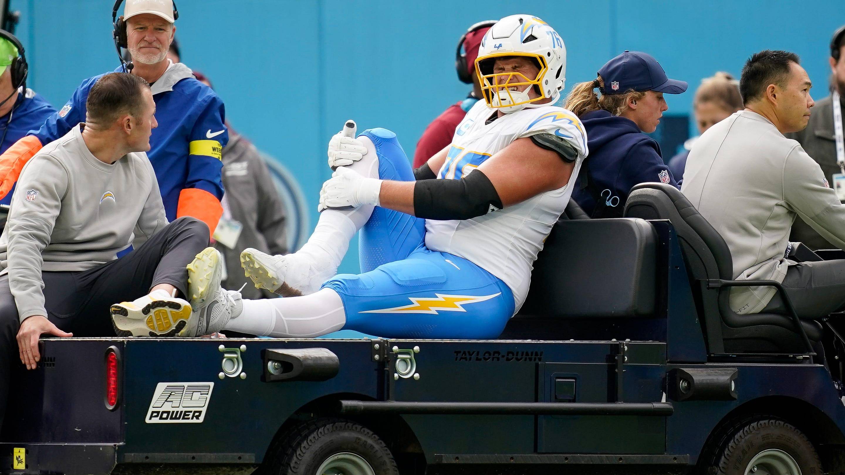 Los Angeles Chargers offensive tackle Joe Alt (76) is carted off after an injury during the second quarter against the Tennessee Titans at Nissan Stadium in Nashville, Tenn., Sunday, Nov. 2, 2025.