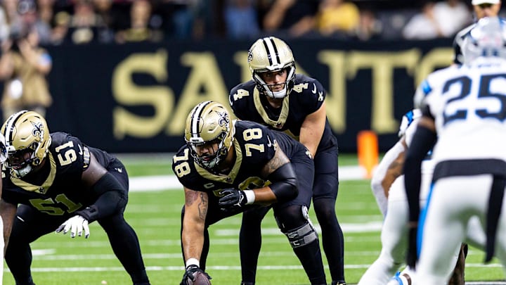 Sep 8, 2024; New Orleans, Louisiana, USA;  New Orleans Saints quarterback Derek Carr (4) calls for the ball from center Erik McCoy (78) against the Carolina Panthers during the first half at Caesars Superdome. Mandatory Credit: Stephen Lew-Imagn Images