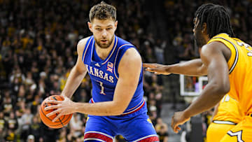 Dec 8, 2024; Columbia, Missouri, USA; Kansas Jayhawks center Hunter Dickinson (1) looks to score against Missouri Tigers center Josh Gray (33) during the first half at Mizzou Arena. Mandatory Credit: Jay Biggerstaff-Imagn Images