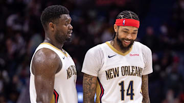 Dec 31, 2023; New Orleans, Louisiana, USA;  New Orleans Pelicans forward Zion Williamson (1) and forward Brandon Ingram (14) share a laugh after a play against the Los Angeles Lakers during the second half at Smoothie King Center. Mandatory Credit: Stephen Lew-Imagn Images