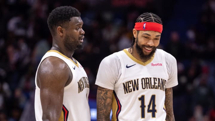 Dec 31, 2023; New Orleans, Louisiana, USA;  New Orleans Pelicans forward Zion Williamson (1) and forward Brandon Ingram (14) share a laugh after a play against the Los Angeles Lakers during the second half at Smoothie King Center. Mandatory Credit: Stephen Lew-USA TODAY Sports