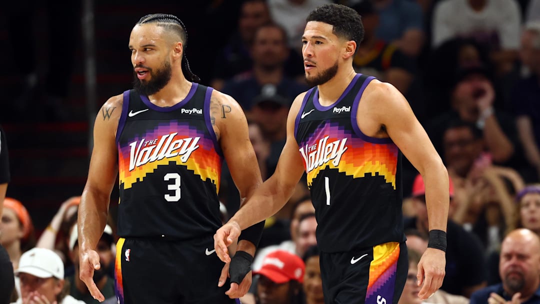 Apr 7, 2026; Phoenix, Arizona, USA; Phoenix Suns forward Dillon Brooks (3) and guard Devin Booker (1) against the Houston Rockets at Mortgage Matchup Center. Mandatory Credit: Mark J. Rebilas-Imagn Images
