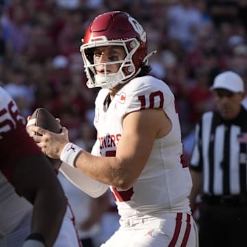 Oklahoma is a home favorite against Missouri in college football Week 13 action.
