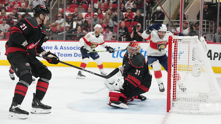 May 28, 2025; Raleigh, North Carolina, USA; Florida Panthers forward Evan Rodrigues (17) scores against Carolina Hurricanes goaltender Frederik Andersen (31) during the second period in game five of the Eastern Conference Final of the 2025 Stanley Cup Playoffs at Lenovo Center. Mandatory Credit: James Guillory-Imagn Images