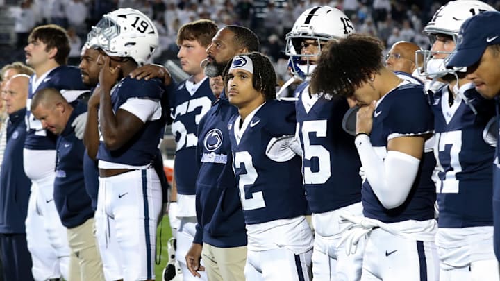 Penn State football players sing their alma mater following the game against the Northwestern Wildcats