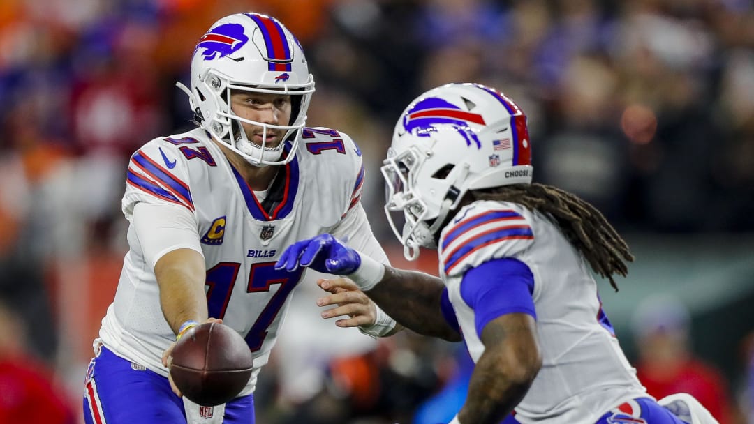 Nov 5, 2023; Cincinnati, Ohio, USA; Buffalo Bills quarterback Josh Allen (17) hands the ball off to running back James Cook (4) in the first half against the Cincinnati Bengals at Paycor Stadium. Mandatory Credit: Katie Stratman-USA TODAY Sports