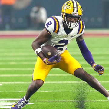 Sep 1, 2024; Paradise, Nevada, USA; LSU Tigers wide receiver Kyren Lacy (2) runs with the ball against the Southern California Trojans during the second quarter at Allegiant Stadium. Mandatory Credit: Stephen R. Sylvanie-USA TODAY Sports