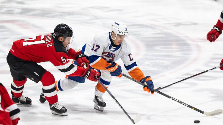 Bridgeport's Ruslan Iskhakov battles with Utica's Kyle Criscuolo at the Adirondack Bank Center on Friday, March 22, 2024.