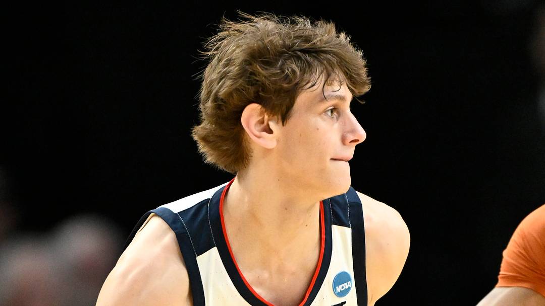 Mar 21, 2026; Portland, OR, USA; Gonzaga Bulldogs guard Davis Fogle (4) dribbles against Texas Longhorns forward Dailyn Swain (3) in the first half during a second round game of the men's 2026 NCAA Tournament at Moda Center. Mandatory Credit: Craig Strobeck-Imagn Images Mar 21, 2026; Portland, OR, USA; Gonzaga Bulldogs guard Davis Fogle (4) dribbles against Texas Longhorns forward Dailyn Swain (3) in the first half during a second round game of the men's 2026 NCAA Tournament at Moda Center. Mandatory Credit: Craig Strobeck-Imagn Images
