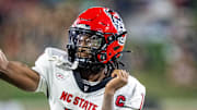 Sep 11, 2025; Winston-Salem, North Carolina, USA;  North Carolina State Wolfpack quarterback CJ Bailey (11) throws a pass in first half against the Wake Forest Demon Deacons at Allegacy Federal Credit Union Stadium. Mandatory Credit: Luke Jamroz-Imagn Images