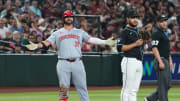 May 13, 2024; Phoenix, Arizona, USA; Cincinnati Reds first base Mike Ford (38) reacts after hitting