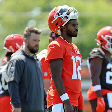 Cleveland Browns quarterback Shedeur Sanders (12) watches from the sideline during day two of NFL rookie minicamp at the Cleveland Browns training facility on Saturday, May 10, 2025, in Berea, Ohio.