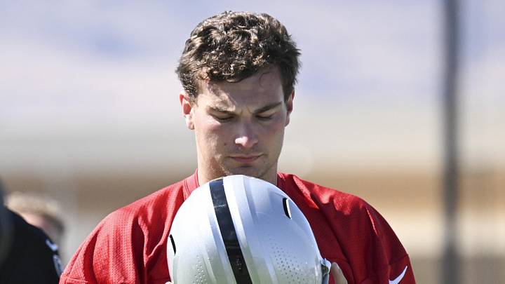 Las Vegas Raiders quarterback Fernando Mendoza stretches during organized team activities.