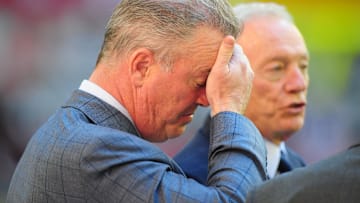Dallas Cowboys executive vice president Stephen Jones (left) reacts alongside owner Jerry Jones prior to the game against the Arizona Cardinals at University of Phoenix Stadium.