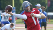 Bills quarterback Josh Allen warms up with throws along the sidelines as he takes the field during the opening day of Buffalo Bills training camp at St. John Fisher University Wednesday, July 24, 2024 in Pittsford.