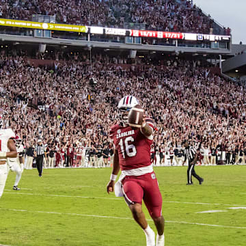 Oct 25, 2025; Columbia, South Carolina, USA; South Carolina Gamecocks quarterback Lanorris Sellers (16) scores a rushing touchdown against the Alabama Crimson Tide in the fourth quarter at Williams-Brice Stadium. Mandatory Credit: Jeff Blake-Imagn Images