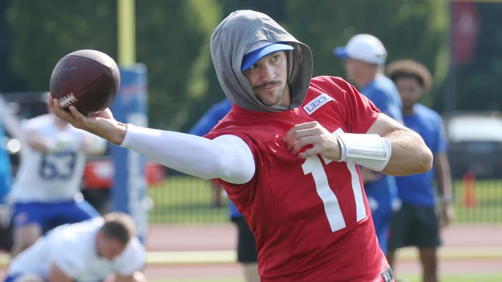 Bills quarterback Josh Allen warms up with throws along the sidelines as he takes the field during the opening day of Buffalo Bills training camp at St. John Fisher University Wednesday, July 24, 2024 in Pittsford.