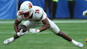 Sep 27, 2025; Pittsburgh, Pennsylvania, USA;  Louisville Cardinals running back Duke Watson (26) runs the ball against the Pittsburgh Panthers during the fourth quarter at Acrisure Stadium. Mandatory Credit: Charles LeClaire-Imagn Images
