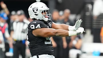 Sep 22, 2024; Paradise, Nevada, USA; Las Vegas Raiders defensive tackle Christian Wilkins (94) celebrates after getting a sack against the Carolina Panthers during the second quarter at Allegiant Stadium. Mandatory Credit: Stephen R. Sylvanie-Imagn Images