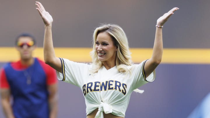 Jun 16, 2023: Paige Spiranac waves to the crowd after throwing out the first pitch.