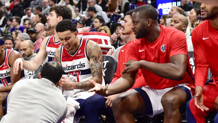 Mar 4, 2024; Salt Lake City, Utah, USA; Washington Wizards forward Kyle Kuzma (33) has his knees wrapped on the bench against the Utah Jazz during the second half at the Delta Center. Mandatory Credit: Christopher Creveling-USA TODAY Sports