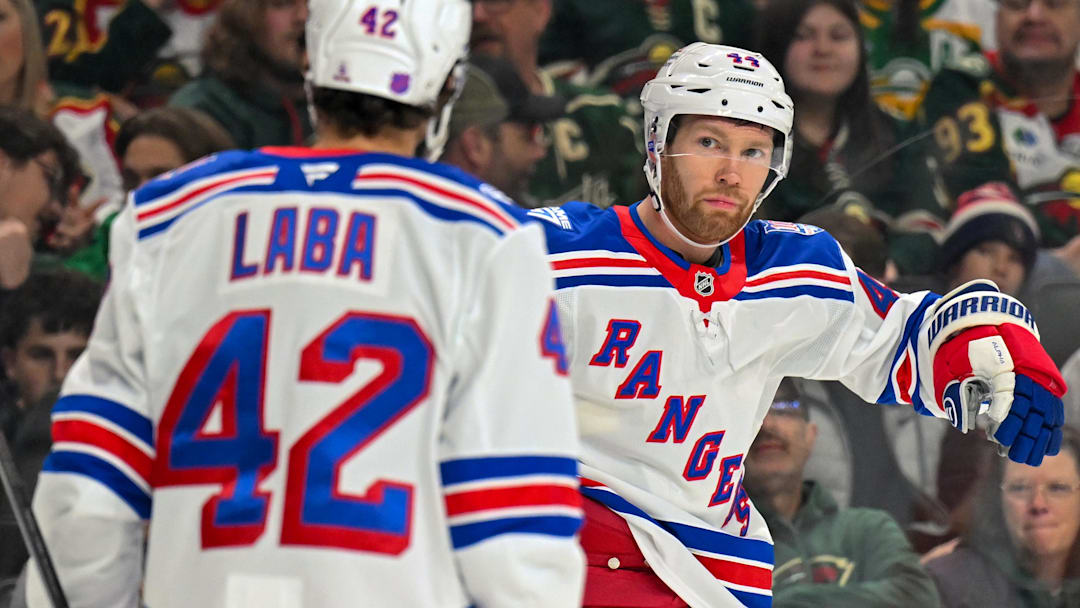 Mar 14, 2026; Saint Paul, Minnesota, USA;  New York Rangers defensemen Vladislav Gavrikov (44) celebrates his goal against the Minnesota Wild with forward Noah Laba (42) during the first period at Grand Casino Arena. Mandatory Credit: Nick Wosika-Imagn Images