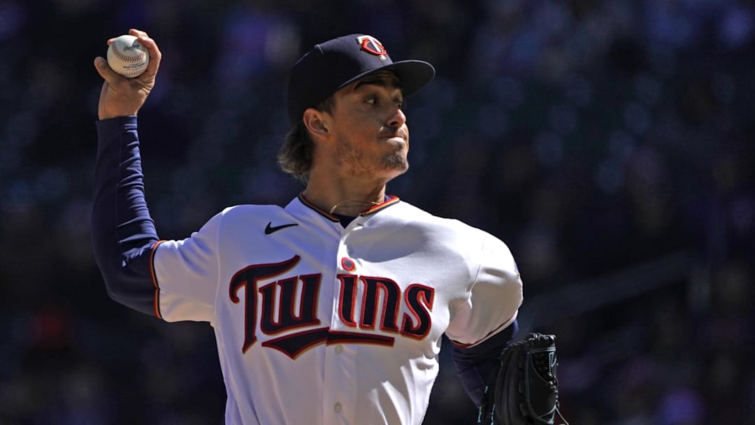 Apr 8, 2022; Minneapolis, Minnesota, USA;  Minnesota Twins starting pitcher Joe Ryan (41) delivers a pitch to Seattle Mariners second base Adam Frazier (26) during the first inning at Target Field. Mandatory Credit: Nick Wosika-Imagn Images
