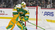 Nov 29, 2024; Saint Paul, Minnesota, USA;  Minnesota Wild goalie Marc-Andre Fleury (29) sets the puck up against the Chicago Blackhawks during the first period Xcel at Energy Center. Mandatory Credit: Nick Wosika-Imagn Images