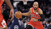 Feb 5, 2025; Minneapolis, Minnesota, USA; Chicago Bulls guard Jevon Carter (5) controls the ball against the Minnesota Timberwolves during the second quarter at Target Center. Mandatory Credit: Nick Wosika-Imagn Images