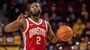 Jan 6, 2025; Minneapolis, Minnesota, USA;  Ohio State Buckeyes guard Bruce Thornton (2) calls a play as he brings the ball up the court against the Minnesota Golden Gophers during the second half at Williams Arena. Mandatory Credit: Nick Wosika-Imagn Images