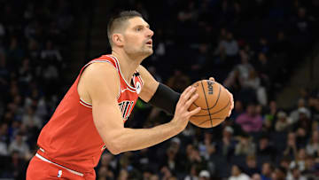 Feb 5, 2025; Minneapolis, Minnesota, USA; Chicago Bulls center Nikola Vucevic (9) shoots the ball against the Minnesota Timberwolves