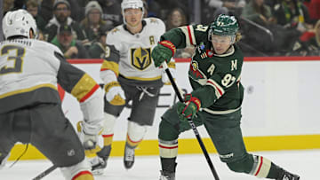 Dec 15, 2024; Saint Paul, Minnesota, USA;  Minnesota Wild forward Kirill Kaprizov (97) takes a shot on goal against The Vegas Golden Knights during the second period at Xcel Energy Center. Mandatory Credit: Nick Wosika-Imagn Images