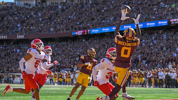 Minnesota Golden Gophers wide receiver Le'Meke Brockington (0) catches an 8-yard pass for a touchdown