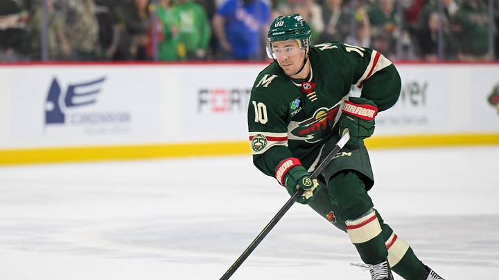 Mar 21, 2026; Saint Paul, Minnesota, USA;  Minnesota Wild forward Bobby Brink (10) controls the puck against the Dallas Stars in overtime at Grand Casino Arena. Mandatory Credit: Nick Wosika-Imagn Images