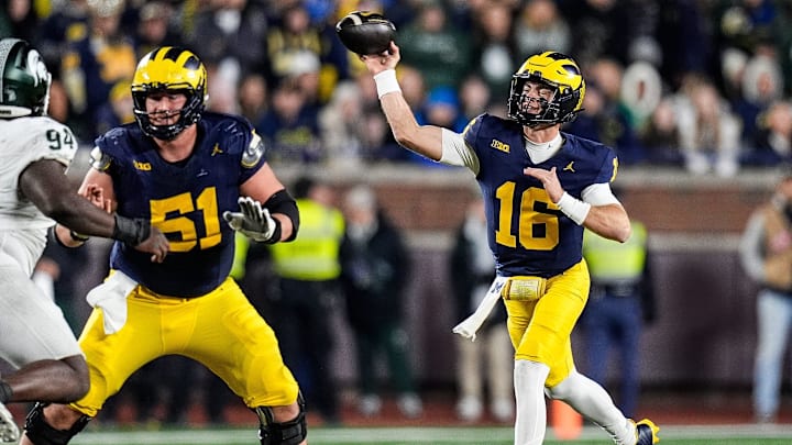 Michigan quarterback Davis Warren (16) makes a pass against Michigan State during the second half at Michigan Stadium in Ann Arbor on Saturday, Oct. 26, 2024.