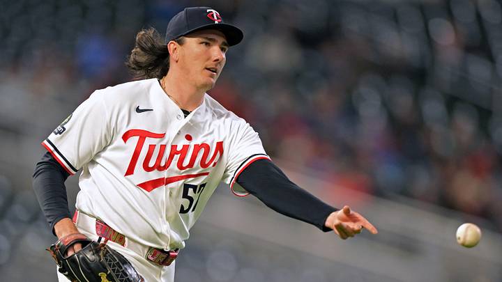 Apr 28, 2026; Minneapolis, Minnesota, USA; Minnesota Twins relief pitcher Kody Funderburk (57) throws the ball to first for an out against the Seattle Mariners during the seventh inning at Target Field. Mandatory Credit: Nick Wosika-Imagn Images