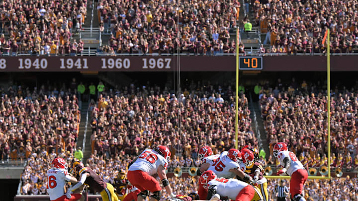 Sep 27, 2025; Minneapolis, Minnesota, USA; Minnesota Golden Gophers defensive back Koi Perich (3) sacks Rutgers Scarlet Knights quarterback Athan Kaliakmanis (16) during the second quarter at Huntington Bank Stadium. Mandatory Credit: Nick Wosika-Imagn Images Sep 27, 2025; Minneapolis, Minnesota, USA; Minnesota Golden Gophers defensive back Koi Perich (3) sacks Rutgers Scarlet Knights quarterback Athan Kaliakmanis (16) during the second quarter at Huntington Bank Stadium. Mandatory Credit: Nick Wosika-Imagn Images