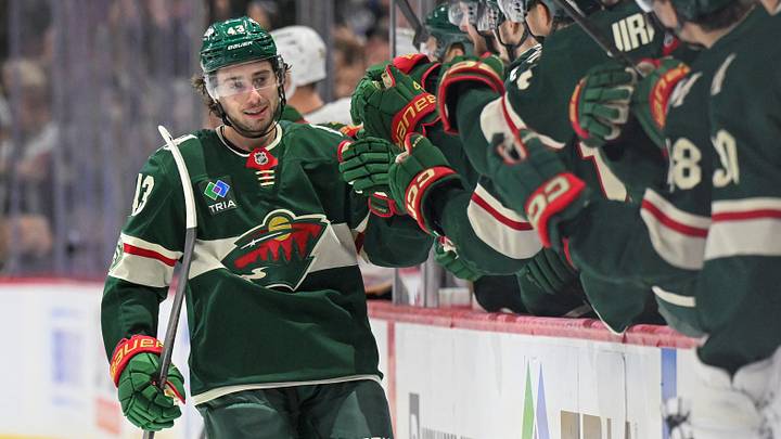 Dec 14, 2025; Saint Paul, Minnesota, USA;  Minnesota Wild defensemen Quinn Hughes (43) celebrates after scoring a goal against the Boston Bruins during the third period at Grand Casino Arena. Mandatory Credit: Nick Wosika-Imagn Images