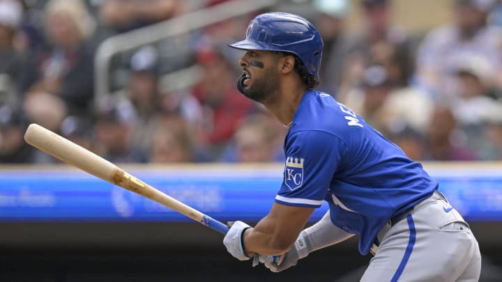 May 27, 2024; Minneapolis, Minnesota, USA; Kansas City Royals outfielder MJ Melendez (1) hits a single against the Minnesota Twins during the sixth inning at Target Field. 
