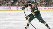 May 1, 2025; Saint Paul, Minnesota, USA;  Minnesota Wild forward Kirill Kaprizov (97) takes a shot on goal against the Vegas Golden Knights during the second period in game six of the first round of the 2025 Stanley Cup Playoffs at Xcel Energy Center. Mandatory Credit: Nick Wosika-Imagn Images