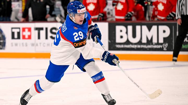 Jan 2, 2026; Minneapolis, Minnesota, USA;  Slovakia forward Tomas Chrenko (29) shoots the puck against Canada during the third period in the quarterfinals of the 2026 IIHF World Junior Championship at 3M Arena. Mandatory Credit: Nick Wosika-Imagn Images