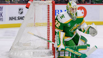 Feb 8, 2025; Saint Paul, Minnesota, USA;  Minnesota Wild goalie Filip Gustavsson (32) tracks the play against the New York Islanders during the first period at Xcel Energy Center. Mandatory Credit: Nick Wosika-Imagn Images