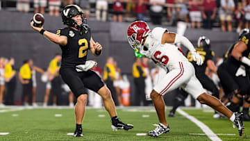 Vanderbilt Commodores quarterback Diego Pavia (2) throws the ball against Alabama Crimson Tide defensive back Red Morgan (16) 