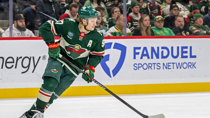 Dec 20, 2024; Saint Paul, Minnesota, USA;  Minnesota Wild forward Kirill Kaprizov (97) turns up ice against the Utah Hockey Club during the third period at Xcel Energy Center. Mandatory Credit: Nick Wosika-Imagn Images