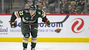 Mar 19, 2025; Saint Paul, Minnesota, USA;  Minnesota Wild forward Marco Rossi (23) heads to the bench after sustaining an injury against the Seattle Kraken during the first period at Xcel Energy Center. Mandatory Credit: Nick Wosika-Imagn Images