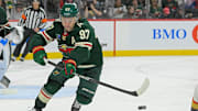 Dec 15, 2024; Saint Paul, Minnesota, USA;  Minnesota Wild forward Kirill Kaprizov (97) makes a pass against The Vegas Golden Knights during the third period at Xcel Energy Center. Mandatory Credit: Nick Wosika-Imagn Images