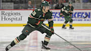 Sep 29, 2024; Saint Paul, Minnesota, USA;  Minnesota Wild forward Liam Ohgren (28) skates with the puck during the third period at Xcel Energy Center. Mandatory Credit: Nick Wosika-Imagn Images