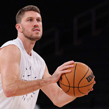 Jan 1, 2025; New York, New York, USA; New York Knicks forward Matt Ryan (37) warms up before the game against the Utah Jazz at Madison Square Garden. Mandatory Credit: Vincent Carchietta-Imagn Images