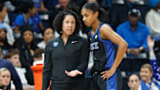 After Duke started the season ranked at No. 7, Kara Lawson (left) has seen her Blue Devils quickly tumble out of the Top 25. 